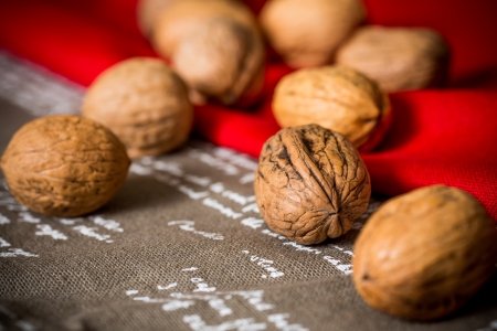 Vintage styled Mixed nuts on brown and red napkin 