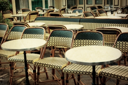 old-fashioned coffee terrace with tables and chairs,paris Franceのeditorial素材
