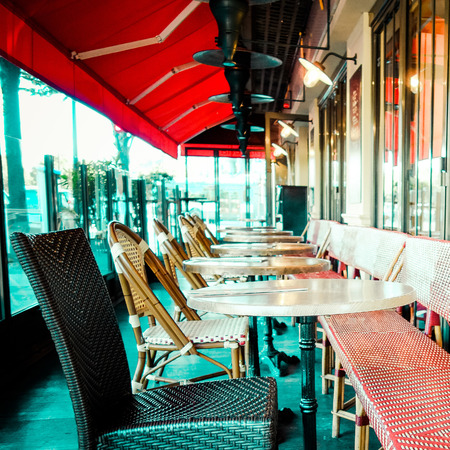 European Street view of a coffee terrace with tables and chairsのeditorial素材