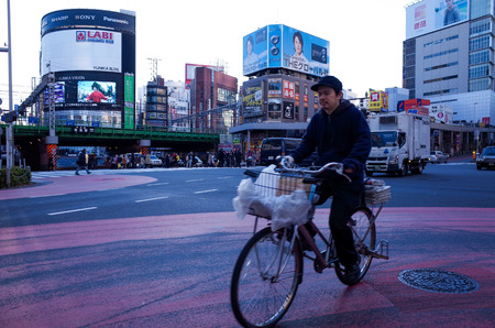 Shinjuku, Tokyo - December 17: Street view of Shinjuku. Shinjuku is a special ward located in Tokyo Metropolis, Population density of 17,140 people per kmÂ². December 17, 2013 in Tokyo, Japan.のeditorial素材