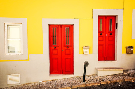 Old wooden door with metal handle in Europeの写真素材