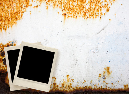 Blank photo frame with textured grunge backgroundの写真素材
