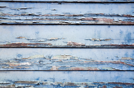 Vintage stained wooden wall background textureの写真素材