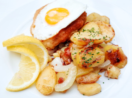 Egg and fries - classical english breakfast with egg and friesの写真素材