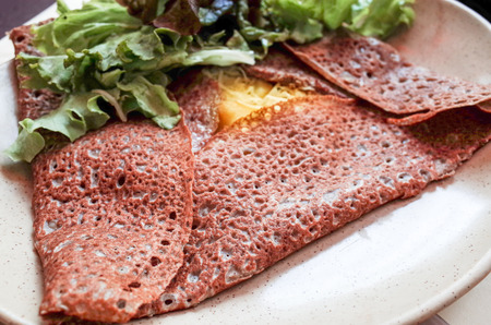 Homemade french buckwheat galette with egg の写真素材