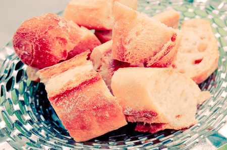 bread in basket - little roll breads in basket on table