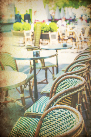 old-fashioned coffee terrace with tables and chairs,paris Franceの写真素材
