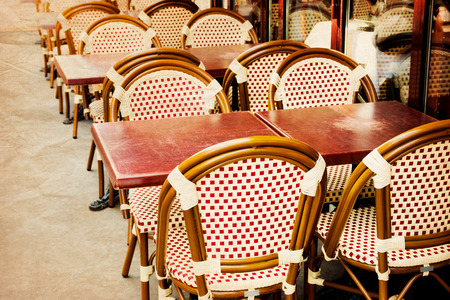 old-fashioned coffee terrace with tables and chairs,paris Franceの写真素材