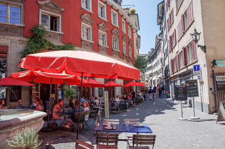 ZURICH, SWITZERLAND-June 21 : Tourists on foot Graben Street in Zurich on June 21, 2014. Zurich is the largest city in Switzerland and the capital. June 21, 2014 in ZURICHのeditorial素材