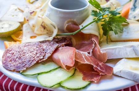 close up of tasty cold meats on the tableの写真素材
