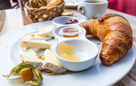 delicious fresh croissant on tableの写真素材