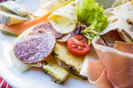close up of tasty cold meats on the tableの写真素材