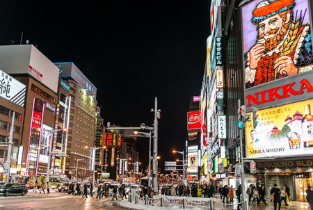 SSAPPORO, JAPAN - December 25, 2015: Street view of Buildings around city night, one of the most popular tourist destinations in Sapporo, Hokkaido, Japan.のeditorial素材