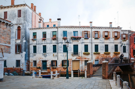 Traditional street view of old buildings in Venice, ITALYの写真素材
