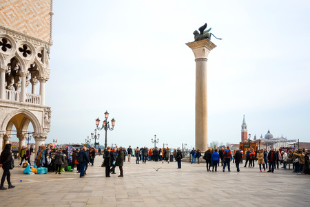 VENICE, ITALY - March 16, 2016.Tourists foot Street in Venice. its entirety is listed as a World...