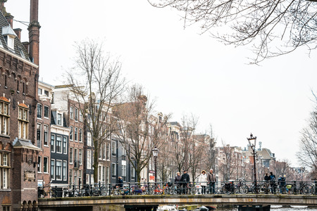 Amsterdam, Netherlands.-March 31, 2016 : Beautiful street view of Traditional old buildings in Amsterdam, the Netherlandsのeditorial素材
