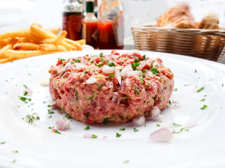 tasty Steak tartare (Raw beef) - classic steak tartare on white plateの写真素材
