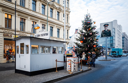BERLIN, GERMANY- 14 December: Checkpoint Charlie. Former bordercross in Berlin on 14 December, 2014. Berlin Wall crossing point between East and West Berlin during the Cold War. BERLIN, GERMANYのeditorial素材