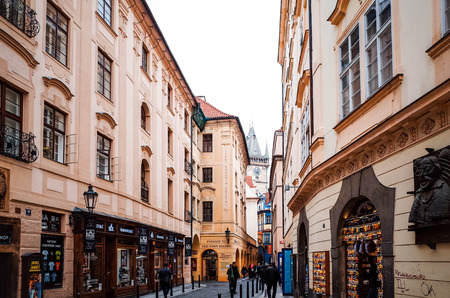 PRAGUE, CZECH REPUBLIC - April 9, 2015 : Tourists on foot Street in old town PRAGUE in Czech Republicのeditorial素材