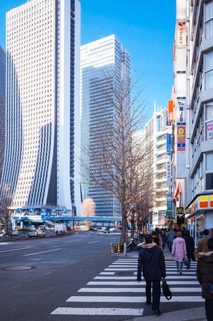 Shinjuku, Tokyo - January 7: Street view of Shinjuku. Shinjuku is a special ward located in Tokyo Metropolis, Population density of 17,140 people per kmÂ². January 7, 2014 in Tokyo, Japan.のeditorial素材