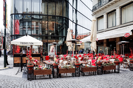 PRAGUE, CZECH REPUBLIC - April 9, 2015 : Tourists on foot Street in old town PRAGUE in Czech Republicのeditorial素材