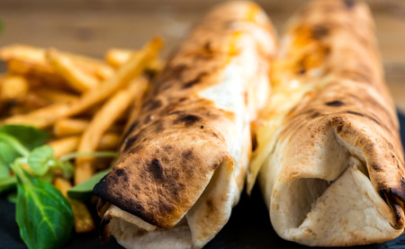 beef tacos served with lettuce and Golden French friesの写真素材