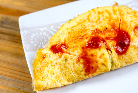 Japanese cuisine - omelet rice warpped on a plateの写真素材