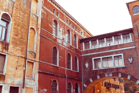 Traditional street view of old buildings in Venice, ITALYの写真素材