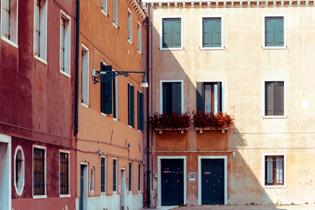 Traditional street view of old buildings in Venice, ITALYの写真素材