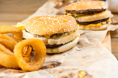 Cheese burger - American cheese burger with Golden onion ringsの写真素材