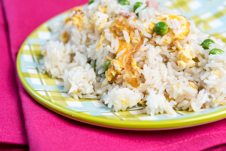 Homemade Chinese fried rice with vegetables and fried eggsの写真素材