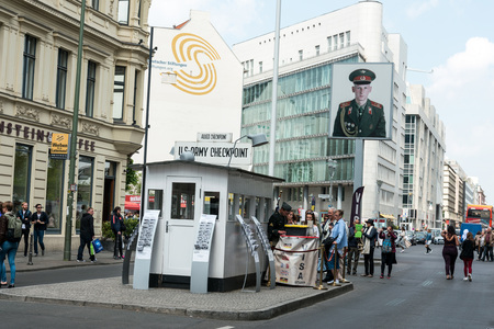 BERLIN, GERMANY- May 15, 2016 : Checkpoint Charlie. Former bordercross in Berlin on May 15, 2016. Berlin Wall crossing point between East and West during the Cold War. BERLIN, GERMANYのeditorial素材