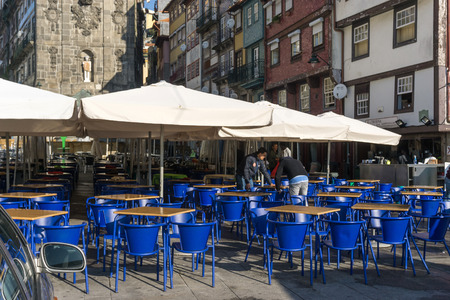 PORTO, PORTUGAL - November 17, 2016. Street view of Open-air cafes in Porto, Portugal, Europe, is the second largest city in Portugal, has a population of 1.4 million.のeditorial素材