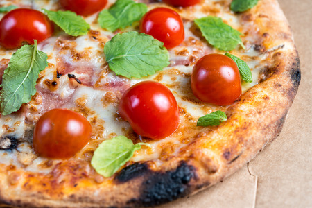 tasty pizza on a the tableの写真素材