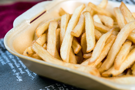 Golden French fries potatoes ready to be eaten