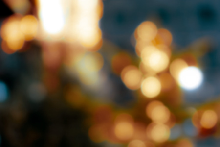 abstract background with bokeh defocused lights and shadowの写真素材