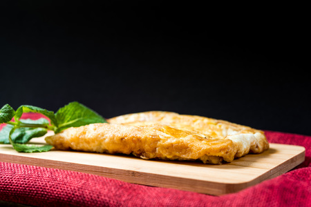 omelet with ham tomato and green saladの写真素材