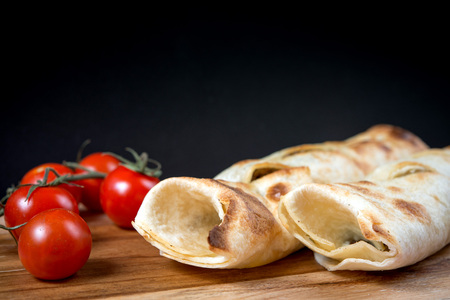 Mexican fajita wraps with grilled chicken fillet and fresh vegetablesの写真素材