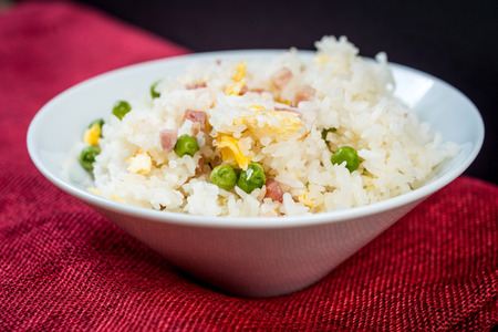 Homemade Chinese fried rice with vegetables and fried eggsの写真素材