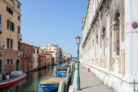 VENICE, ITALY - May 18, 2017.Tourists foot Street in Venice. its entirety is listed as a World Heritage Site, along with its lagoon. VENICE, ITALYのeditorial素材