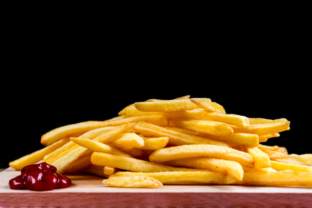 Golden French fries potatoes ready to be eaten