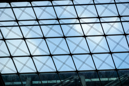 View of a modern glass skyscraper buildings aroundの写真素材