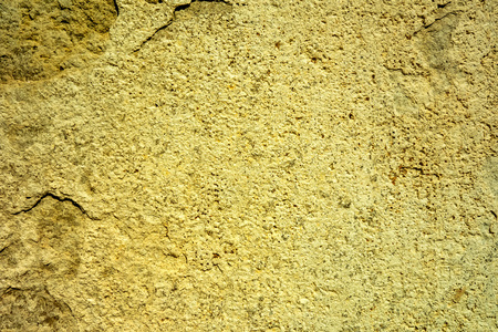 Brown grungy wall Sandstone surface backgroundの写真素材