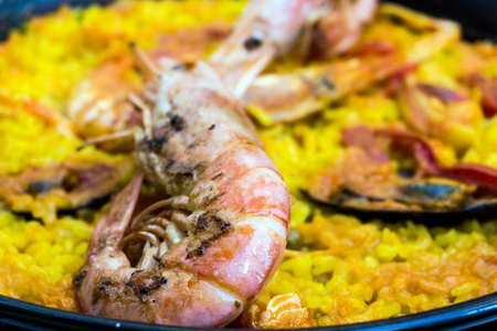 Prawn with rice - closeup of prawn with rice - traditionnal spanish food paellaの写真素材
