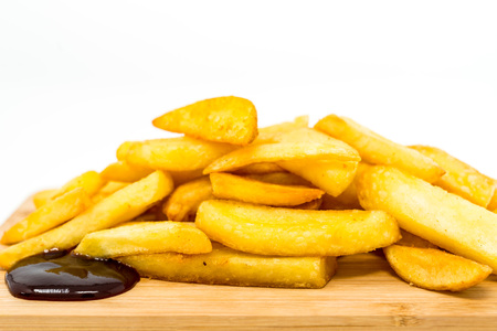 Golden French fries potatoes ready to be eaten