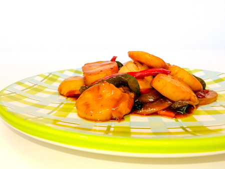 wok fried Scallops with sweet peppers and chinese vegetablesの写真素材