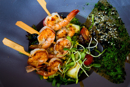 plate of asian cuisine shrimp with vegetablesの写真素材