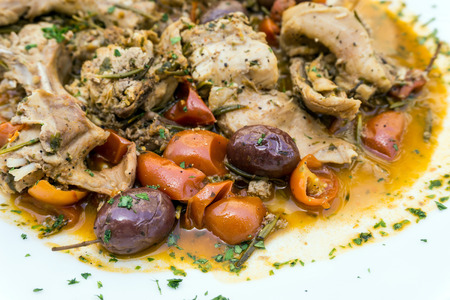 juicy grilled pork leg with vegetablesの写真素材