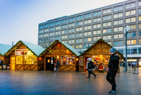 BERLIN, GERMANY - DECEMBER 23, 2016: street view of decorated booths and christmas lights at Christmas Market.のeditorial素材