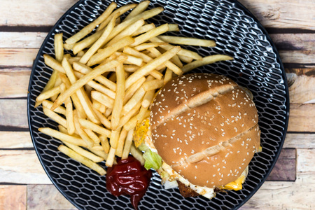 American fish burger with Golden French friesの写真素材